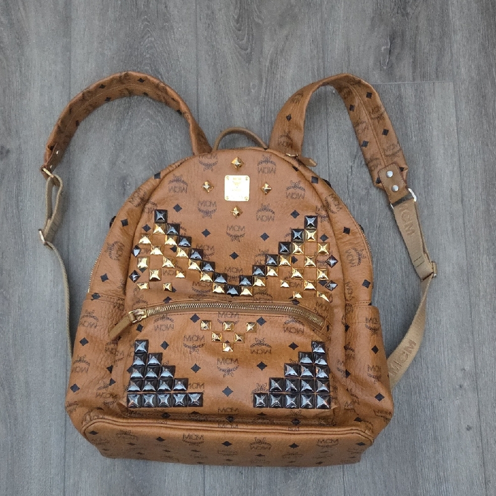 MCM Brown Backpack with Gold and Black Accents